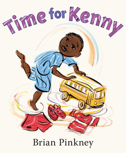 Time for Kenny by Brian Pinkney. A young boy plays with a toy bus.  His clothes and shoes lay on the floor in front of him. 